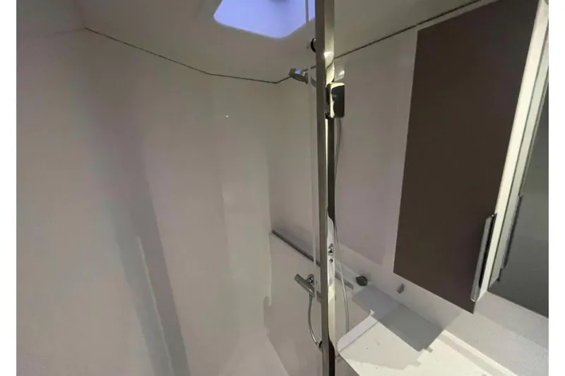 Fonn Taistil Domhain Yacht Photos Pics Modern bathroom interior of 2025 Fountaine Pajot 41 yacht, featuring sleek design and fixtures.