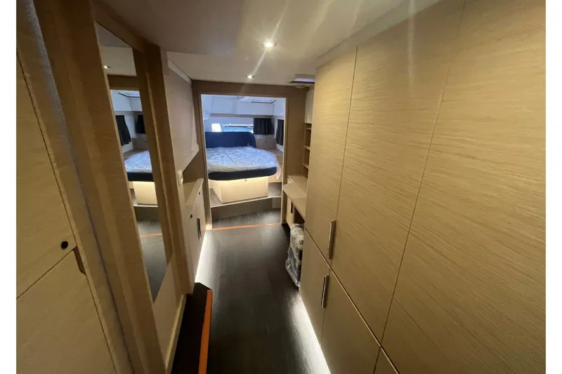 Fonn Taistil Domhain Yacht Photos Pics Luxurious interior of 2025 Fountaine Pajot 41 yacht with modern wood finishes.