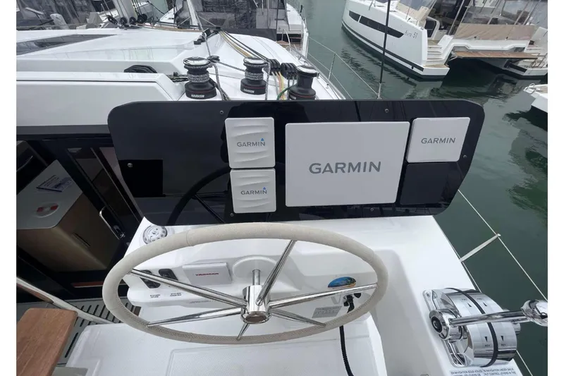 Fonn Taistil Domhain Yacht Photos Pics Helm of 2025 Fountaine Pajot 41 catamaran with Garmin navigation system.
