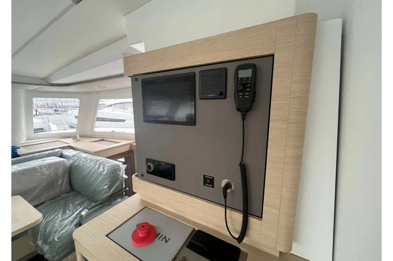 Fonn Taistil Domhain Yacht Photos Pics Interior of 2025 Fountaine Pajot 41 yacht with control panel and modern design.