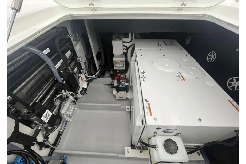 Fonn Taistil Domhain Yacht Photos Pics Engine compartment of 2025 Fountaine Pajot 41 catamaran, showcasing mechanical components and systems.