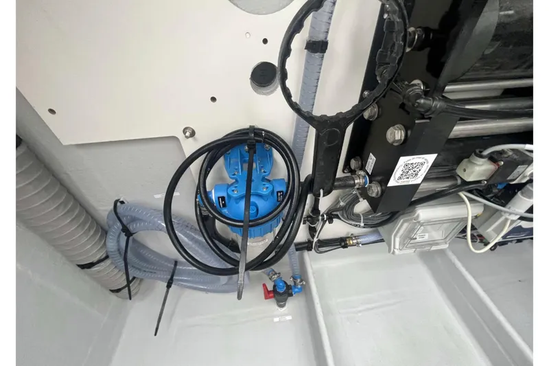 Fonn Taistil Domhain Yacht Photos Pics Engine room of 2025 Fountaine Pajot 41, featuring mechanical components and wiring.