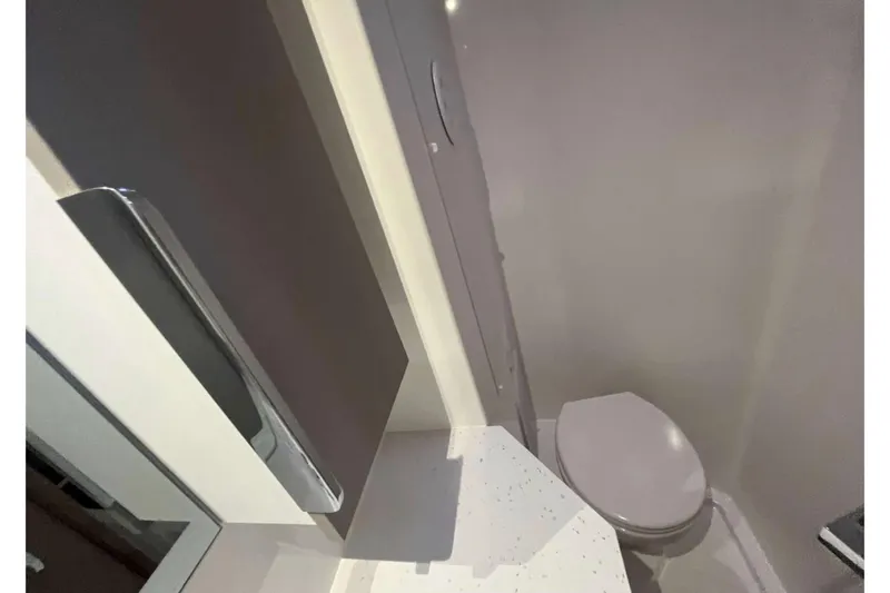 Fonn Taistil Domhain Yacht Photos Pics Modern bathroom interior of 2025 Fountaine Pajot 41 yacht, featuring sleek design elements.