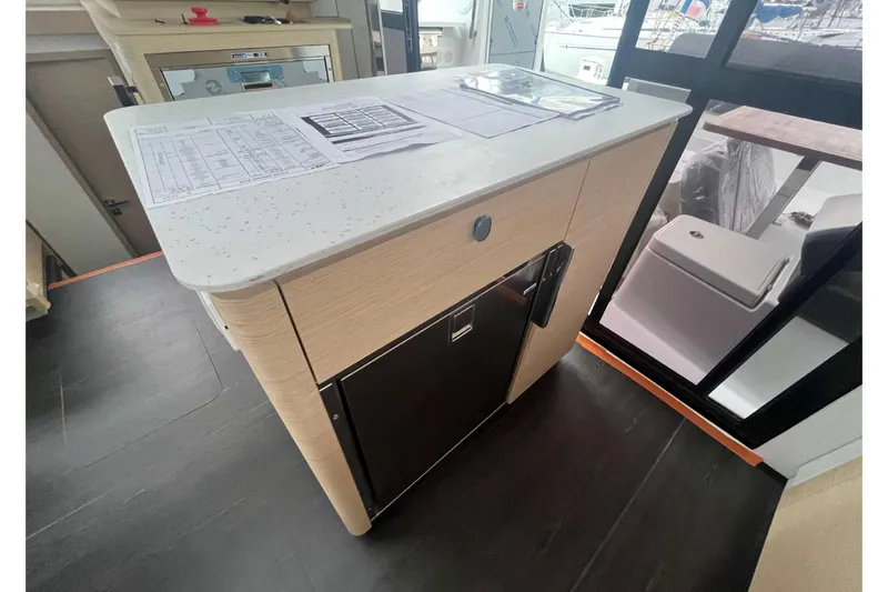 Fonn Taistil Domhain Yacht Photos Pics Modern kitchen area in 2025 Fountaine Pajot 41 yacht with sleek countertop and cabinetry.