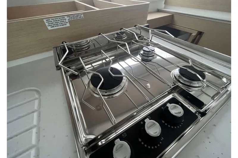 Fonn Taistil Domhain Yacht Photos Pics Stainless steel stove in 2025 Fountaine Pajot 41 yacht kitchen.