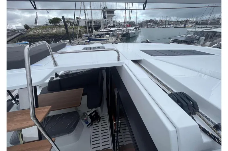Fonn Taistil Domhain Yacht Photos Pics 2025 Fountaine Pajot 41 yacht docked at marina, showcasing sleek deck design.