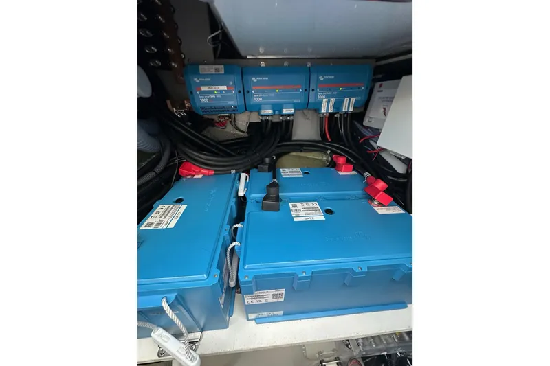 Fonn Taistil Domhain Yacht Photos Pics Electrical system of 2025 Fountaine Pajot 41 yacht with blue batteries and wiring.