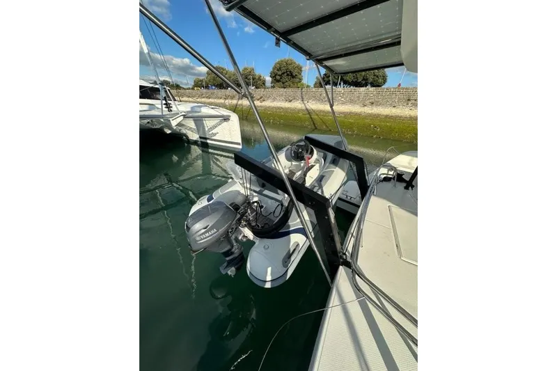 Fonn Taistil Domhain Yacht Photos Pics 2025 Fountaine Pajot 41 catamaran with Yamaha outboard motor in marina setting.