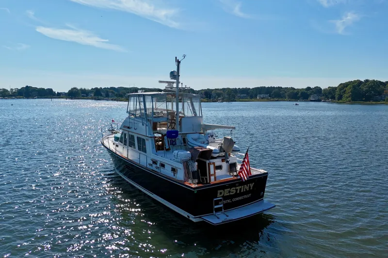 Destiny Yacht Photos Pics 1997 Sabre Sabreline 47 yacht "Destiny" on serene water, sunny day, Mystic, Connecticut.