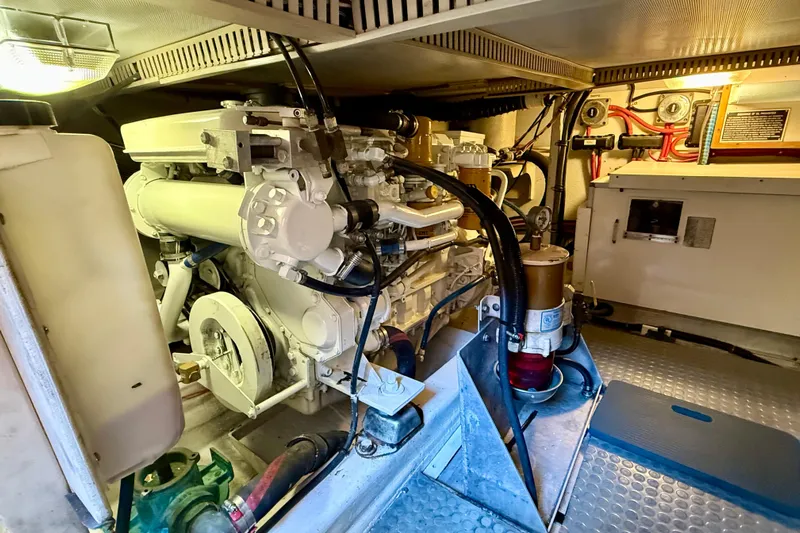 Destiny Yacht Photos Pics Engine room of a 1997 Sabre Sabreline 47 yacht, showcasing mechanical components.