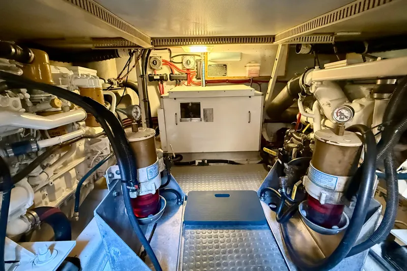 Destiny Yacht Photos Pics Engine room of a 1997 Sabre Sabreline 47 yacht, showcasing machinery and equipment.
