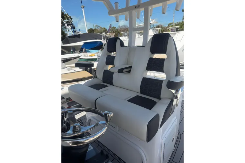  Yacht Photos Pics 2024 Tidewater 3100 Carolina Bay boat seating with modern design and comfortable upholstery.