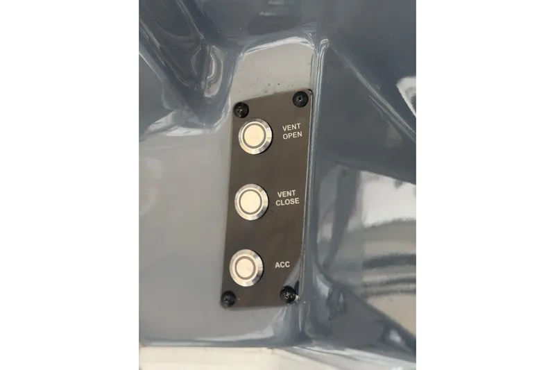  Yacht Photos Pics Control panel with buttons labeled "Vent Open," "Vent Close," and "ACC" on 2024 Tidewater 3100 Carolina Bay.