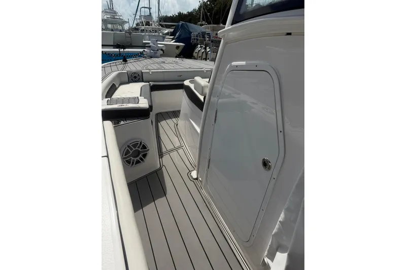  Yacht Photos Pics 2024 Tidewater 3100 Carolina Bay boat interior with sleek design and modern features.