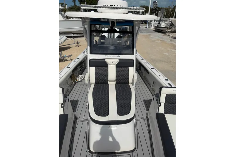  Yacht Photos Pics 2024 Tidewater 3100 Carolina Bay boat interior with sleek seating and modern design.