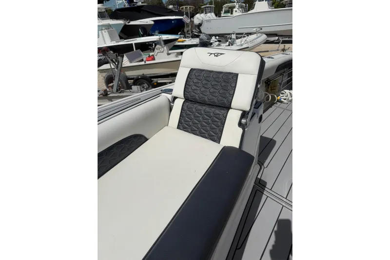  Yacht Photos Pics 2024 Tidewater 3100 Carolina Bay boat seat with quilted upholstery design.