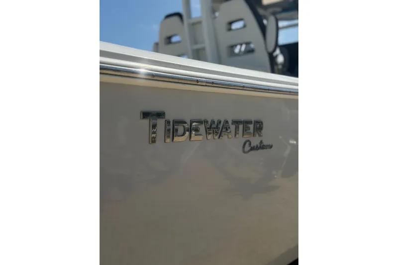  Yacht Photos Pics 2024 Tidewater 3100 Carolina Bay boat with custom logo detail.