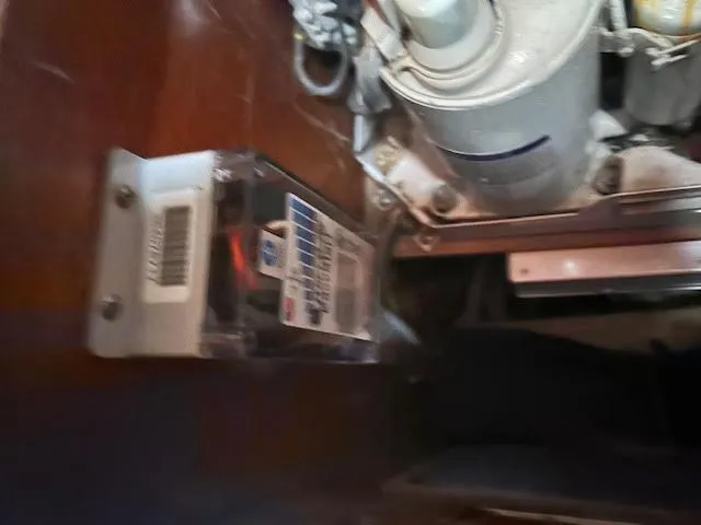 Exeter II Yacht Photos Pics Engine compartment of a 1988 Sabre 38 sailboat with mechanical components.