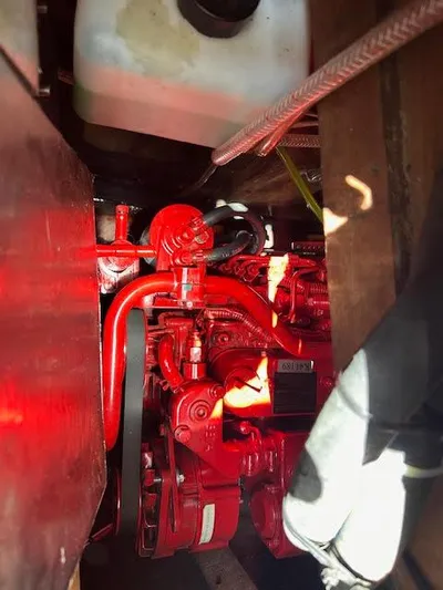 Exeter II Yacht Photos Pics 1988 Sabre 38 engine compartment with red engine components.