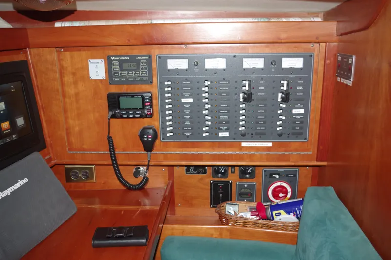 4869tw Yacht Photos Pics Control panel of a 2001 Tartan 4100 yacht with navigation and communication equipment.