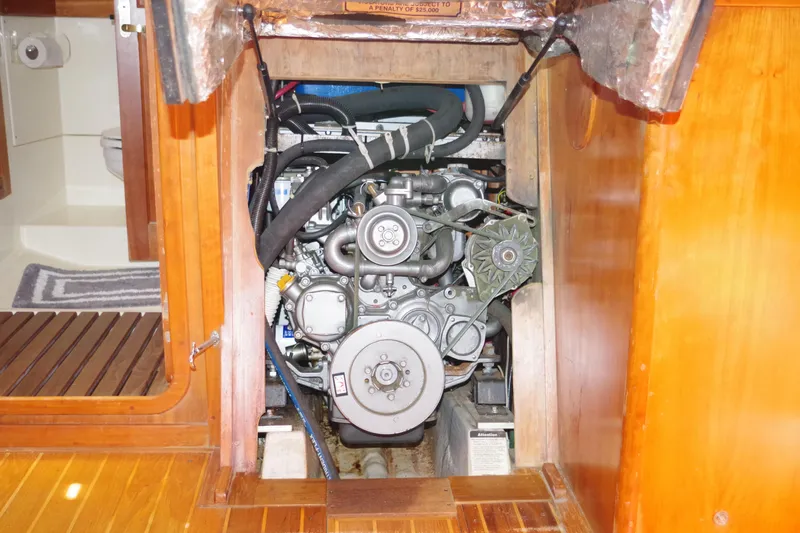 4869tw Yacht Photos Pics Engine compartment of a 2001 Tartan 4100 sailboat, showcasing detailed mechanical components.