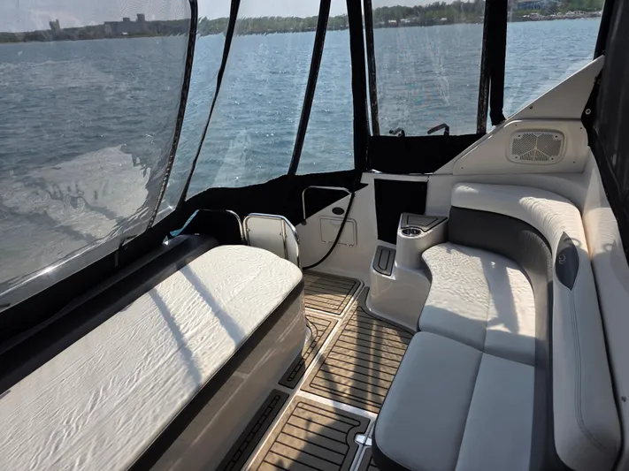  Yacht Photos Pics 2005 Regal Commodore 4260 yacht interior with seating, overlooking a serene lake view.