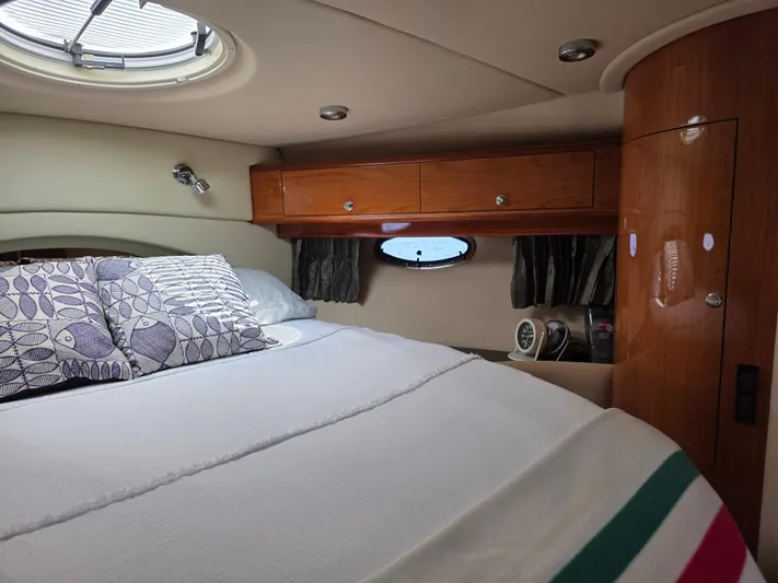  Yacht Photos Pics Luxurious cabin interior of 2005 Regal Commodore 4260 yacht with cozy bedding.