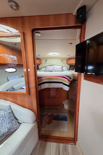  Yacht Photos Pics Interior of 2005 Regal Commodore 4260 yacht with cozy cabin and modern amenities.