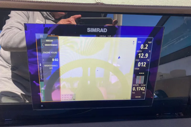  Yacht Photos Pics Simrad display on 2022 Sea Ray SDX 270 Outboard showing navigation and engine data.