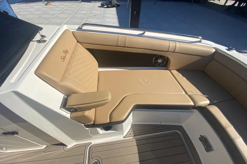  Yacht Photos Pics 2022 Sea Ray SDX 270 Outboard boat with luxurious tan seating and stylish design.