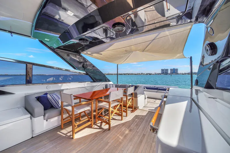  Yacht Photos Pics Luxurious 2018 Riva 76' Bahamas yacht interior with elegant seating and ocean view.