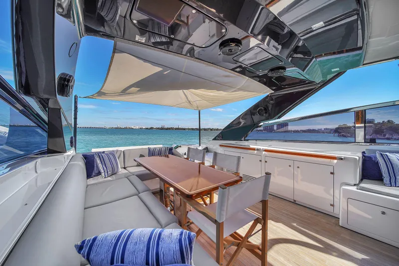  Yacht Photos Pics Luxurious 2018 Riva 76' Bahamas yacht interior with elegant seating and ocean view.