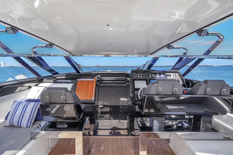  Yacht Photos Pics 2018 Riva 76' Bahamas yacht interior with sleek design and modern controls.