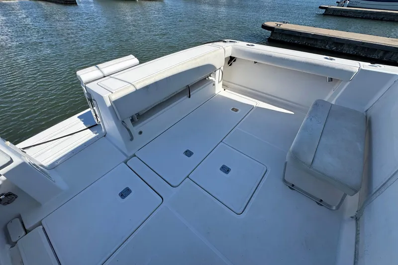 Lone Star Yacht Photos Pics 2005 Tiara Yachts 3200 Open boat deck with seating and storage compartments.