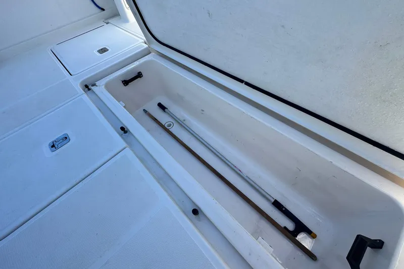 Lone Star Yacht Photos Pics Storage compartment on a 2005 Tiara Yachts 3200 Open boat deck.
