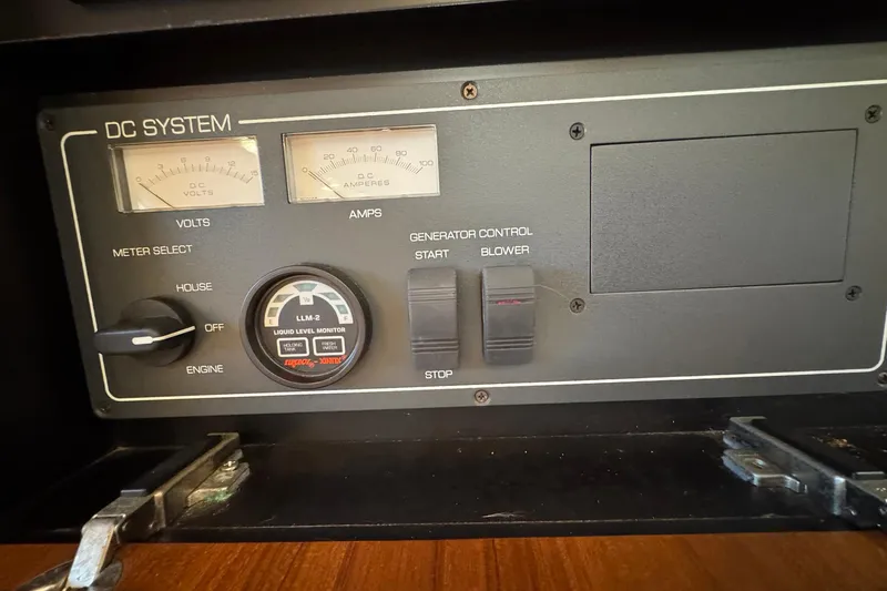 Lone Star Yacht Photos Pics Control panel of a 2005 Tiara Yachts 3200 Open, featuring DC system gauges and switches.