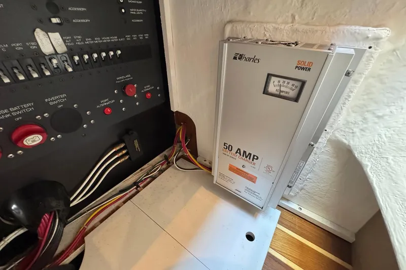 Lone Star Yacht Photos Pics Electrical panel and 50 AMP battery charger on a 2005 Tiara Yachts 3200 Open.