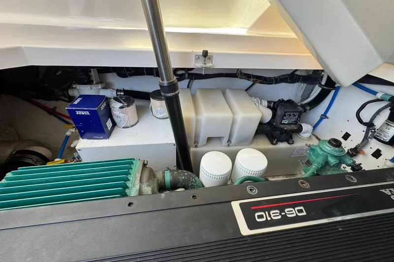 Lone Star Yacht Photos Pics Engine compartment of a 2005 Tiara Yachts 3200 Open, featuring Volvo Penta components.