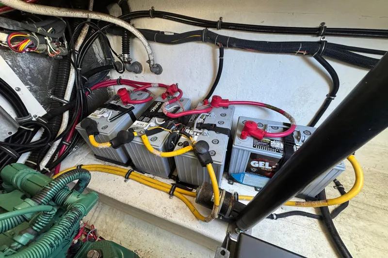 Lone Star Yacht Photos Pics Battery compartment of a 2005 Tiara Yachts 3200 Open, featuring multiple gel batteries.