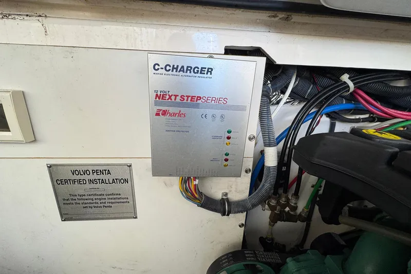 Lone Star Yacht Photos Pics Engine compartment of a 2005 Tiara Yachts 3200 Open with C-Charger and Volvo Penta certification.