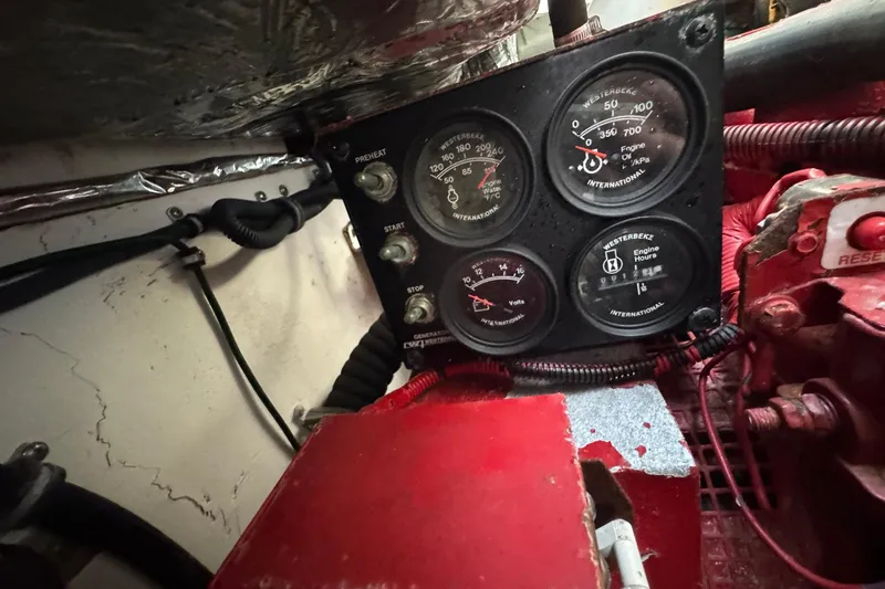 Lone Star Yacht Photos Pics Engine control panel of a 2005 Tiara Yachts 3200 Open, featuring gauges and wiring.