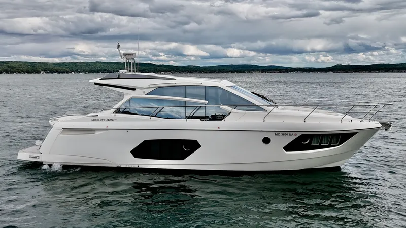 Yes Dear! Yacht Photos Pics 2016 Absolute Sport Yacht on calm waters under cloudy skies.