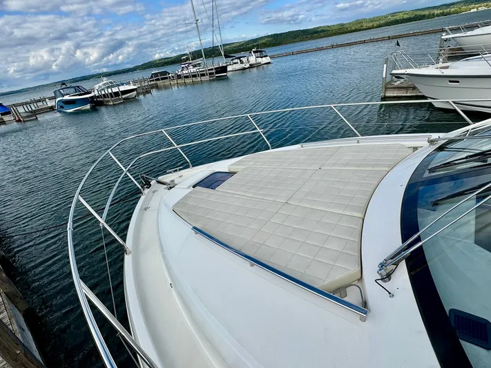 Yes Dear! Yacht Photos Pics 2016 Absolute Sport Yacht docked at marina with scenic water view.