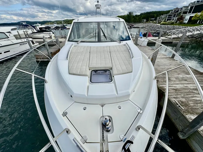 Yes Dear! Yacht Photos Pics 2016 Absolute Sport Yacht docked at marina, featuring sleek design and spacious deck.