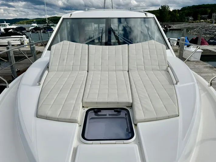 Yes Dear! Yacht Photos Pics Luxurious 2016 Absolute Sport Yacht with cushioned sunbathing area, docked at marina.