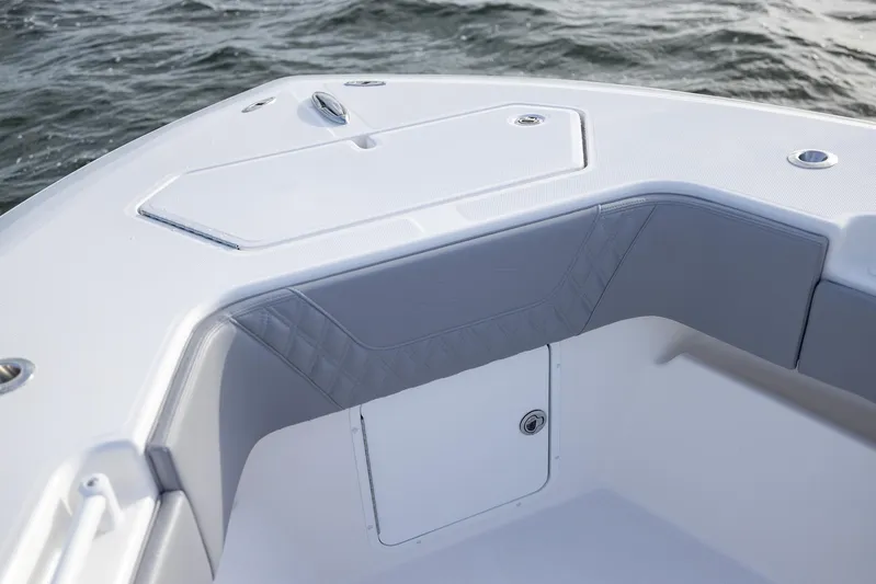  Yacht Photos Pics 2025 Invincible 33 Open Fisherman boat interior detail with ocean backdrop.