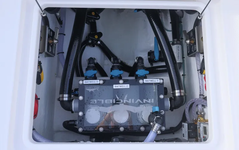  Yacht Photos Pics 2025 Invincible 33 Open Fisherman boat plumbing system with labeled valves and hoses.