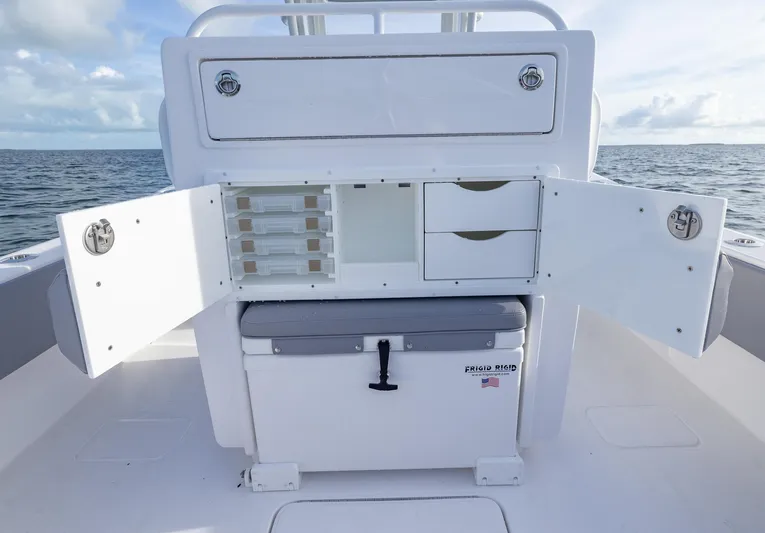  Yacht Photos Pics 2025 Invincible 33 Open Fisherman boat storage compartments open on deck.