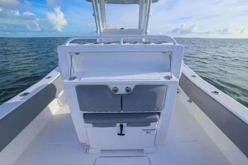  Yacht Photos Pics 2025 Invincible 33 Open Fisherman boat on open water, showcasing sleek design and spacious deck.