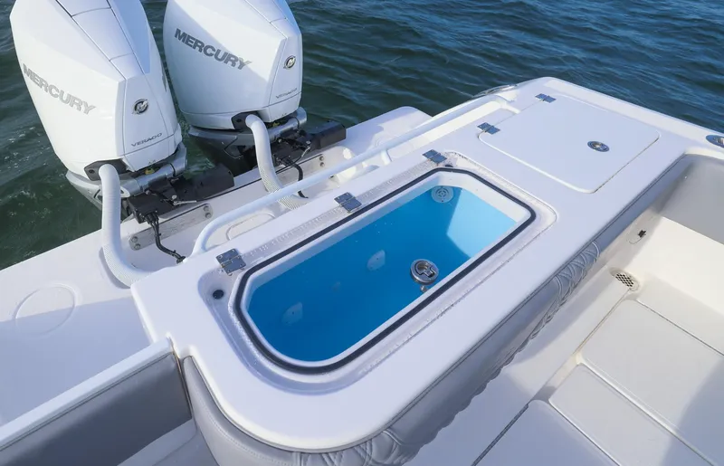  Yacht Photos Pics 2025 Invincible 33 Open Fisherman boat with dual Mercury engines and livewell.